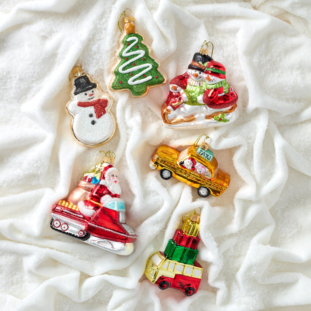 Blown Glass Santa On Snowmobile Ornament